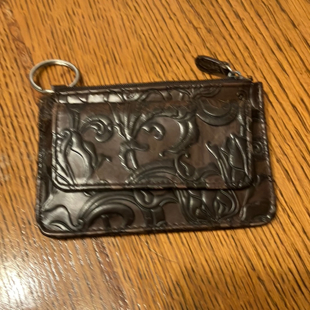 Wilson’s tooled leather zip ID good condition and credit card holder is worn